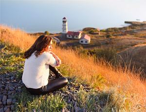 woman with beacon lighthouse